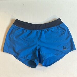 Blue and grey Reebok athletic shorts